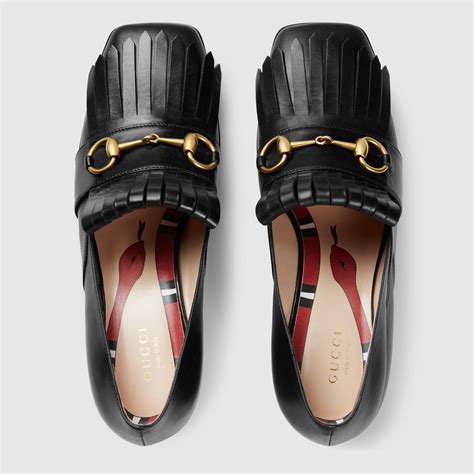 gucci leather mid heel loafer.